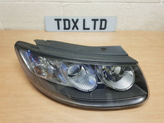 Hyundai Santa Fe Driver Side Headlight 2010-2012 - photo 1 of 6