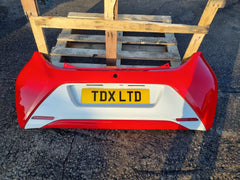 Toyota Aygo MK2 2014-2017 Pre-facelift Genuine Rear Bumper in Red and White - photo 1 of 18