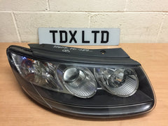 Hyundai Santa Fe Driver Side Headlight 2010-2012 - photo 1 of 3