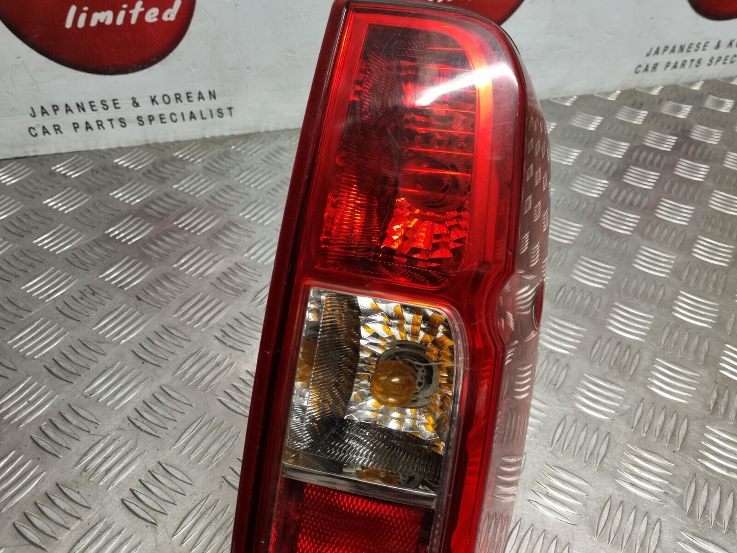 NISSAN NAVARA D40 MK2 2005-2015 GENUINE DRIVERS SIDE REAR OUTER BRAKE LIGHT LAMP